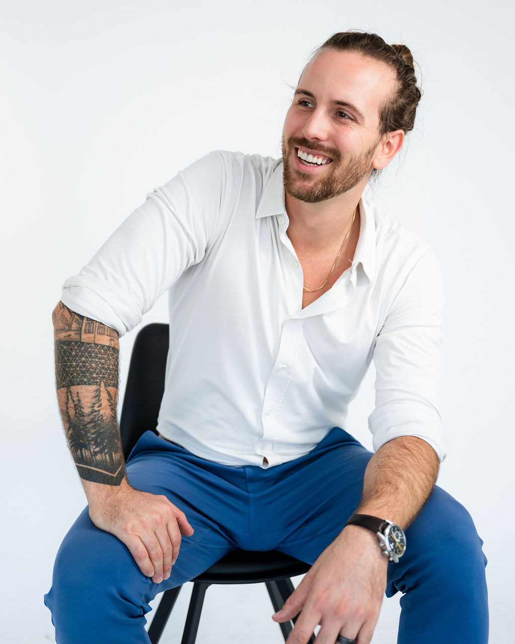 Trey, founder of Beeline Agency and owner of Boho Med Spa, seated and smiling